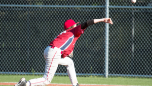 a baseball player throwing a ball