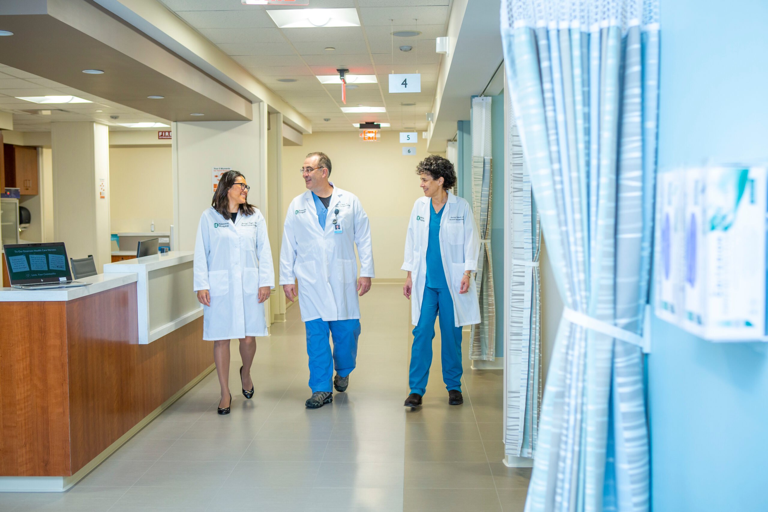 Dr. Jennifer Nayor Dr. John Dowd Andrea Fribush walking in unit smiling at Dr. Nayor 1 scaled