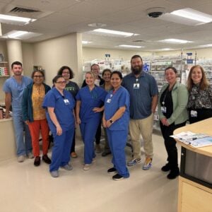 Group of healthcare professionals in pharmacy